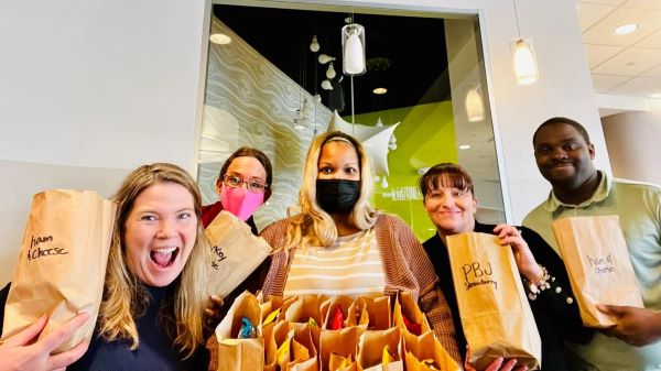Apple Staff making sandwiches for SERVE